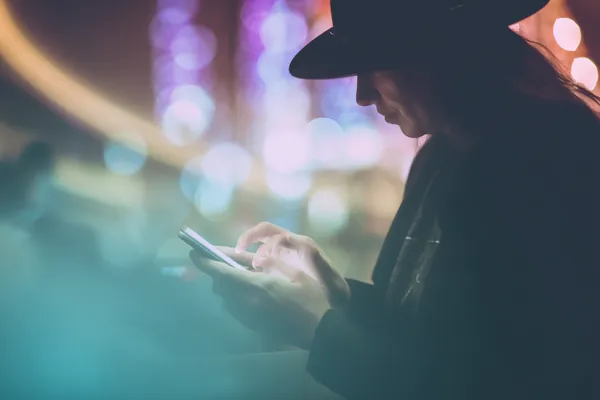 GOOB111 Login — Instantly access your secure account A confident dealer surrounded by casino chips inviting players to access their GOOB111 account, reflecting quick and easy login options.